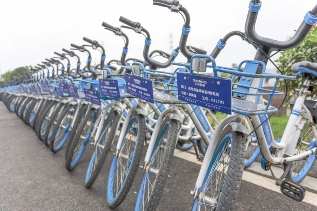 Z6官网工业城开明共享单车 员工通勤绿色便捷